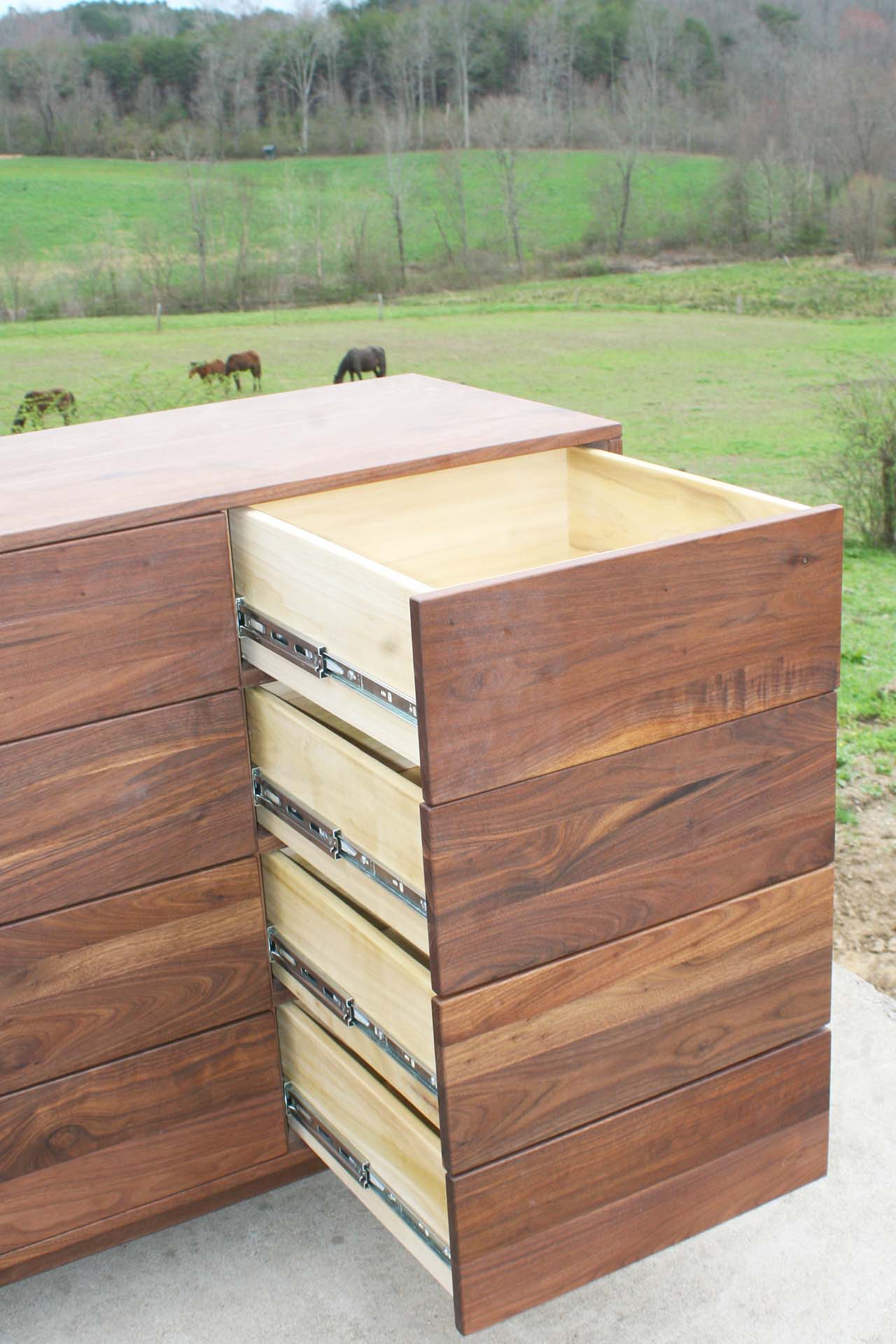 12-drawer-dresser-with-inset-drawers-and-flat-panel-sides right most drawers extended close up