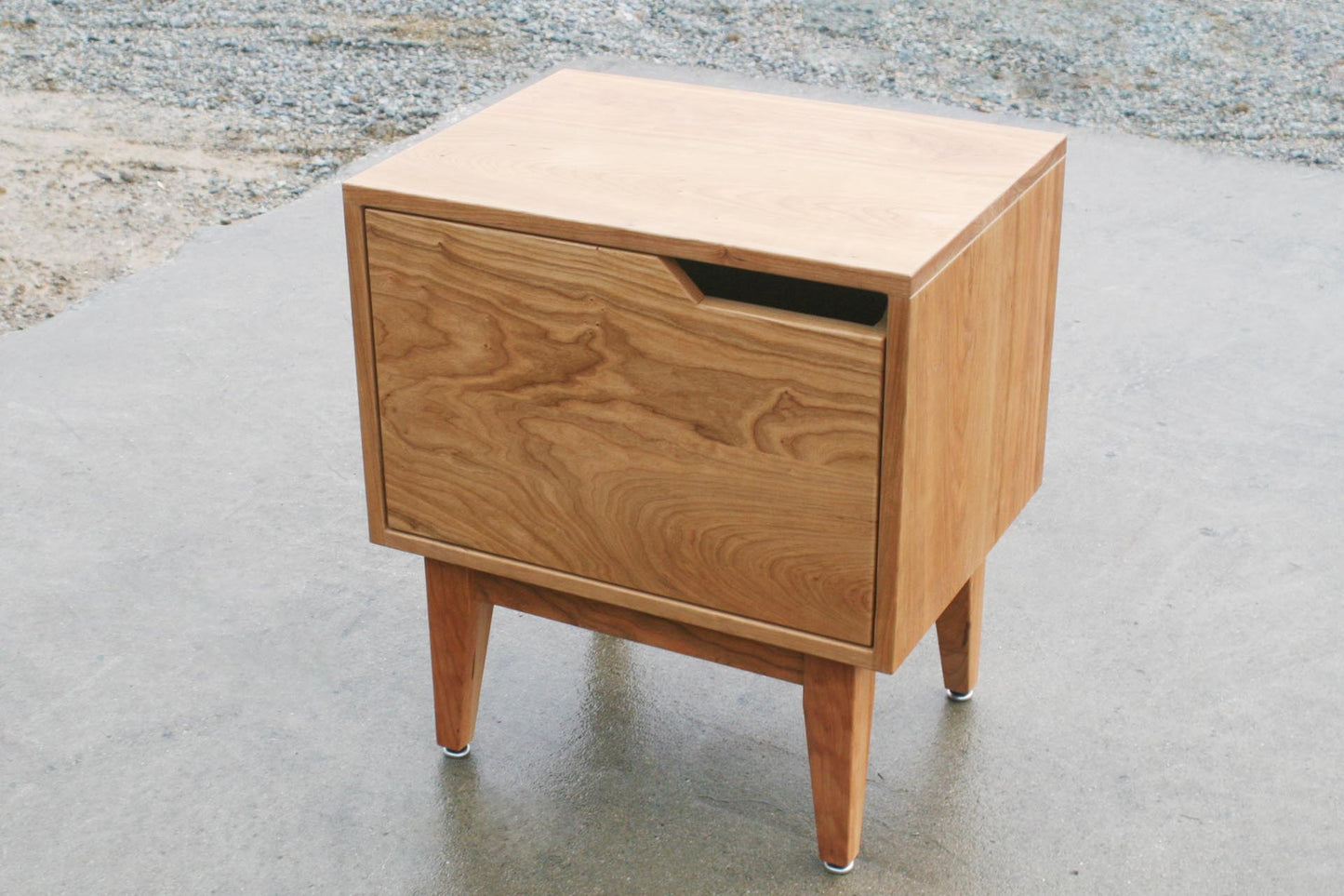 angled view solid hardwood bedside table