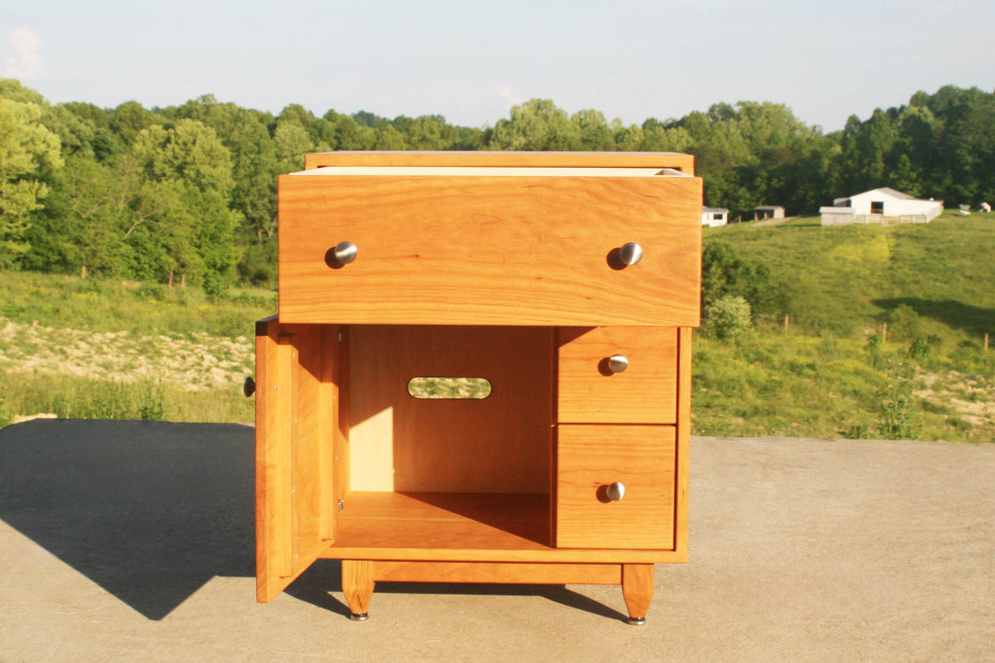 Art Deco nightstand with drawers open