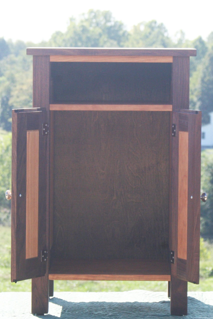 bedside cabinet with 1 shelf and raised panel doors open
