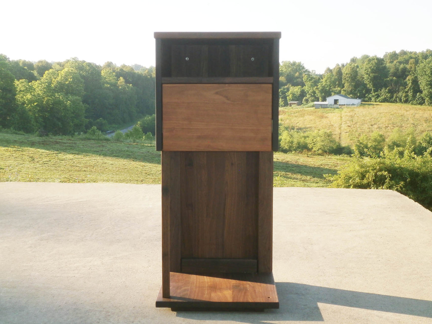 Overhanging table with drawer, shelf and support bar front view low