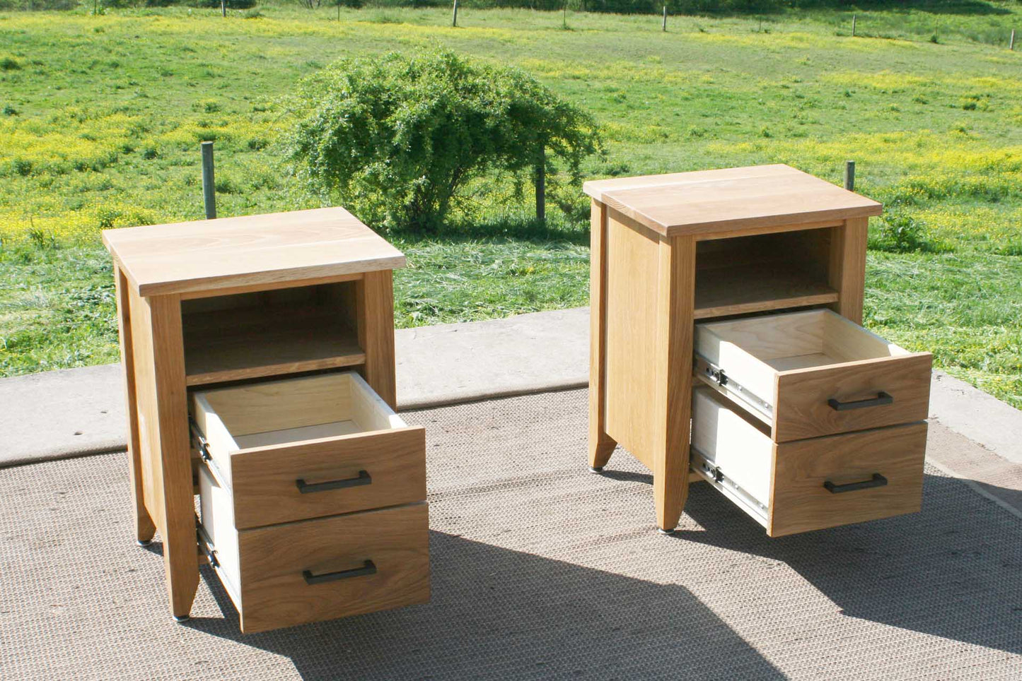 Nightstands with 2 drawers open and 1 shelf each
