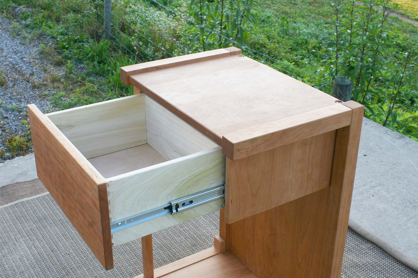 Pass-Through Bedside Table with 1 Drawer open top angled view