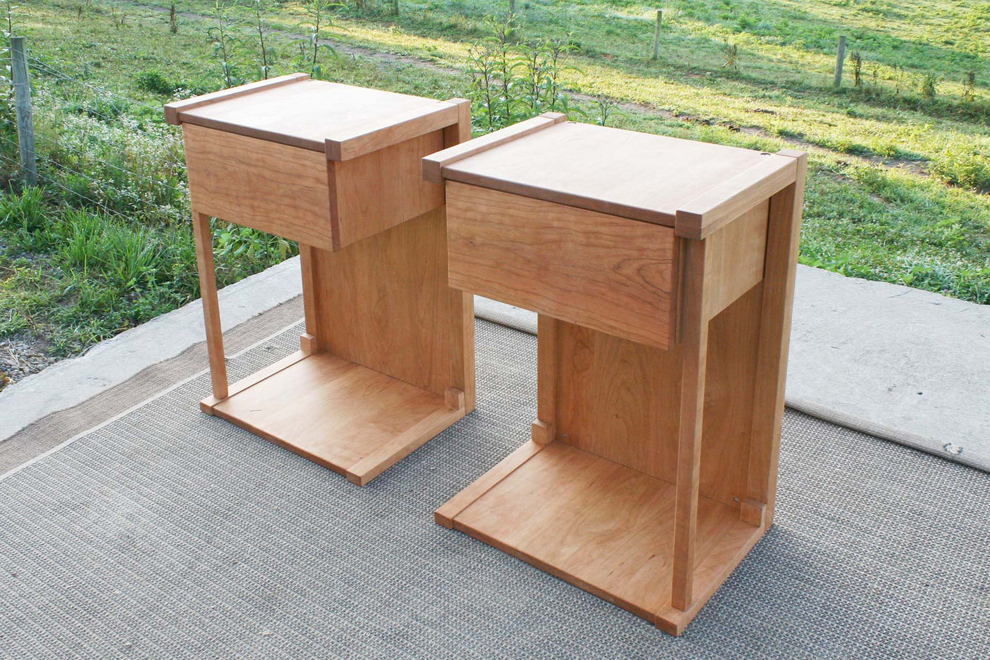 angled view Pass-Through Bedside Table with 1 Drawer hardwood