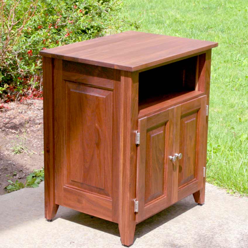 angled view Bedside Cabinet with 1 shelf and raised panel doors