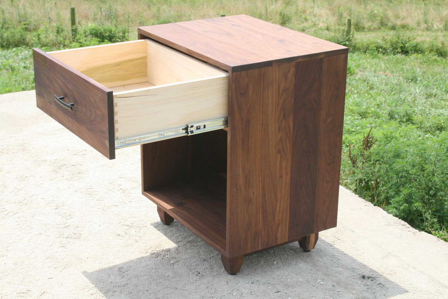 nightstand with one drawer open