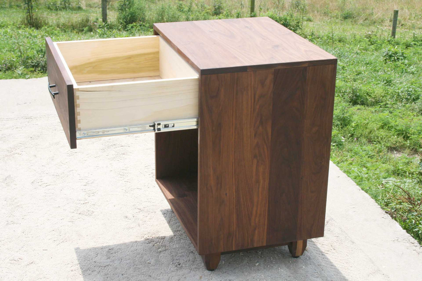walnut nightstand with drawer open