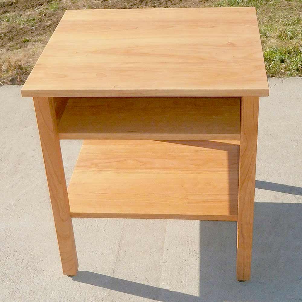 top of hardwood nightstand with storage space