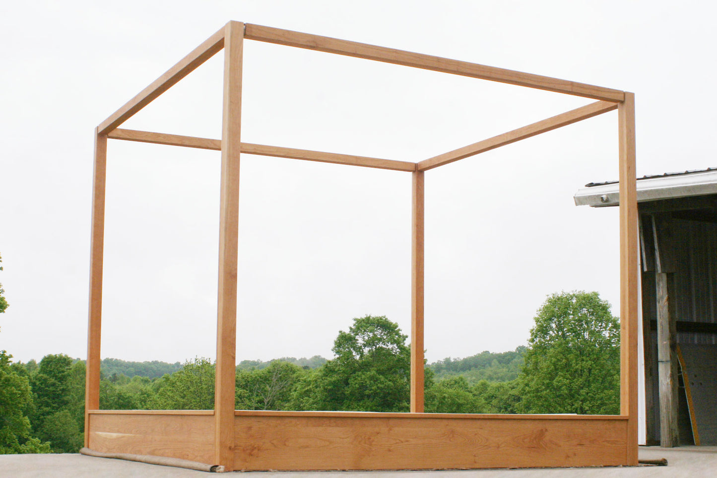 wood Modern canopy bed with wide platform and large rails