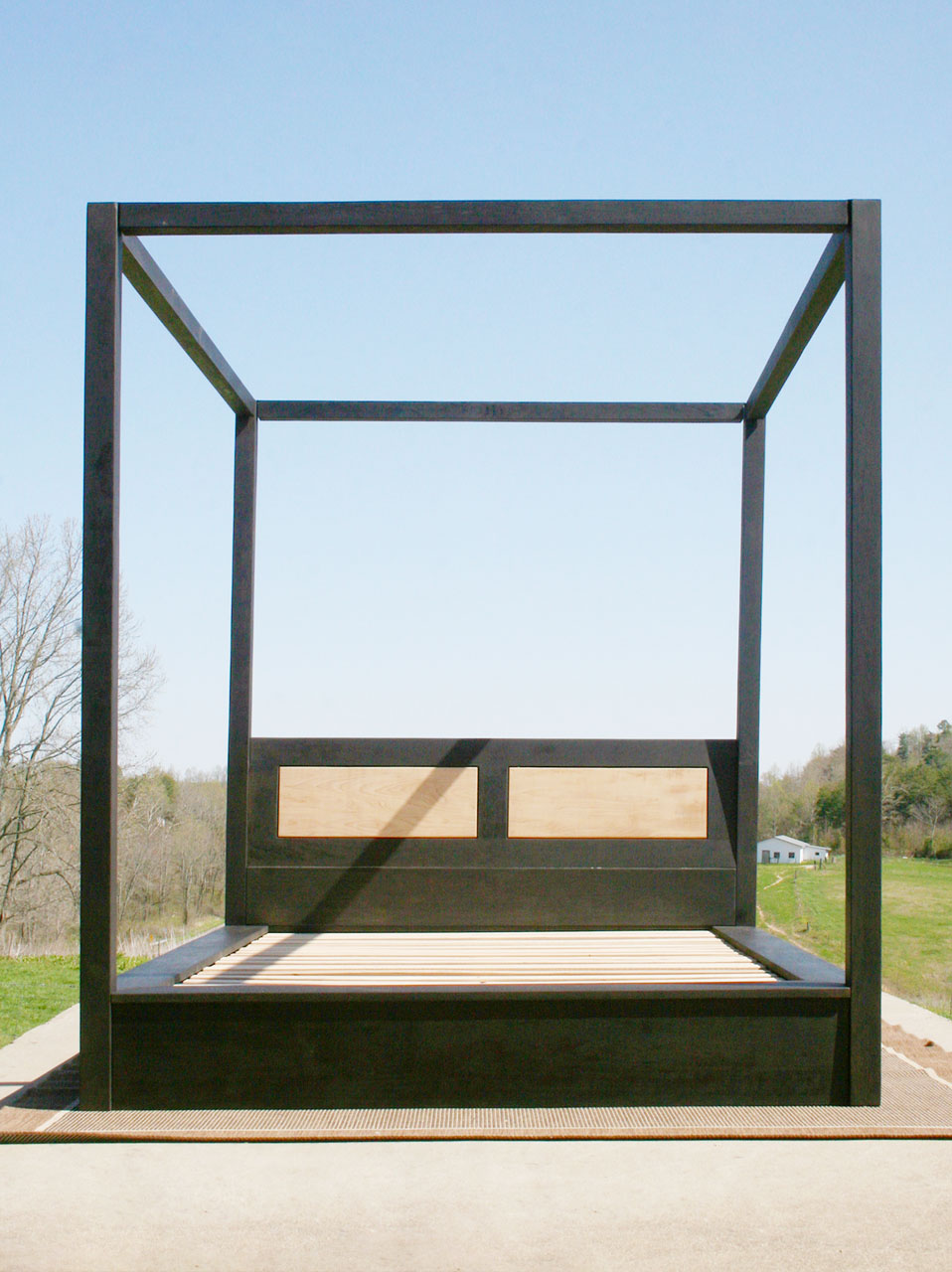 solid wood Canopy Bed with angled headboard and large rails