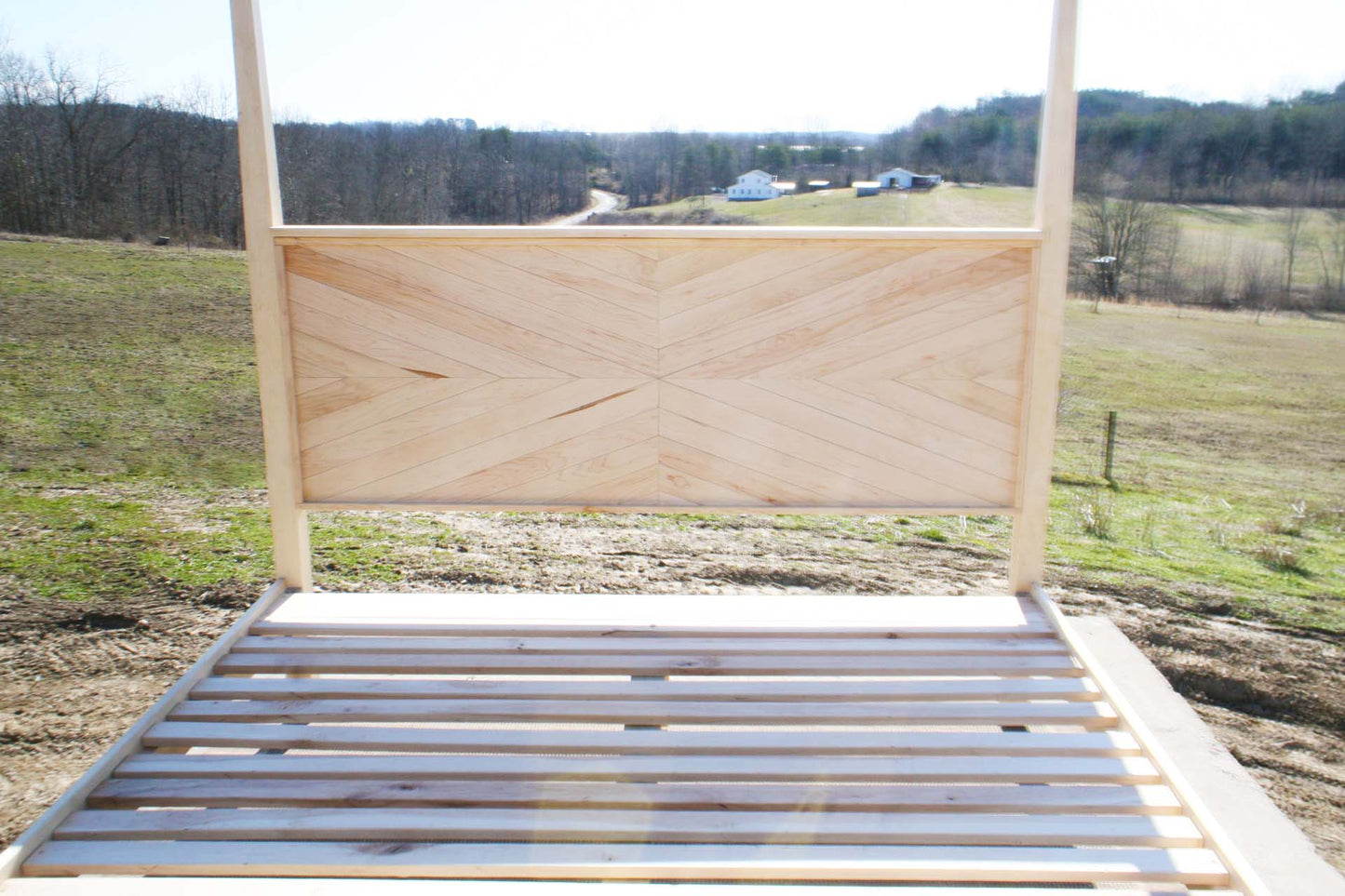 headboard of natural Canopy bed with tapered posts and headboard