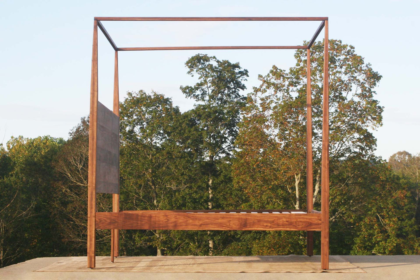 side view natural canopy bed with tapered posts