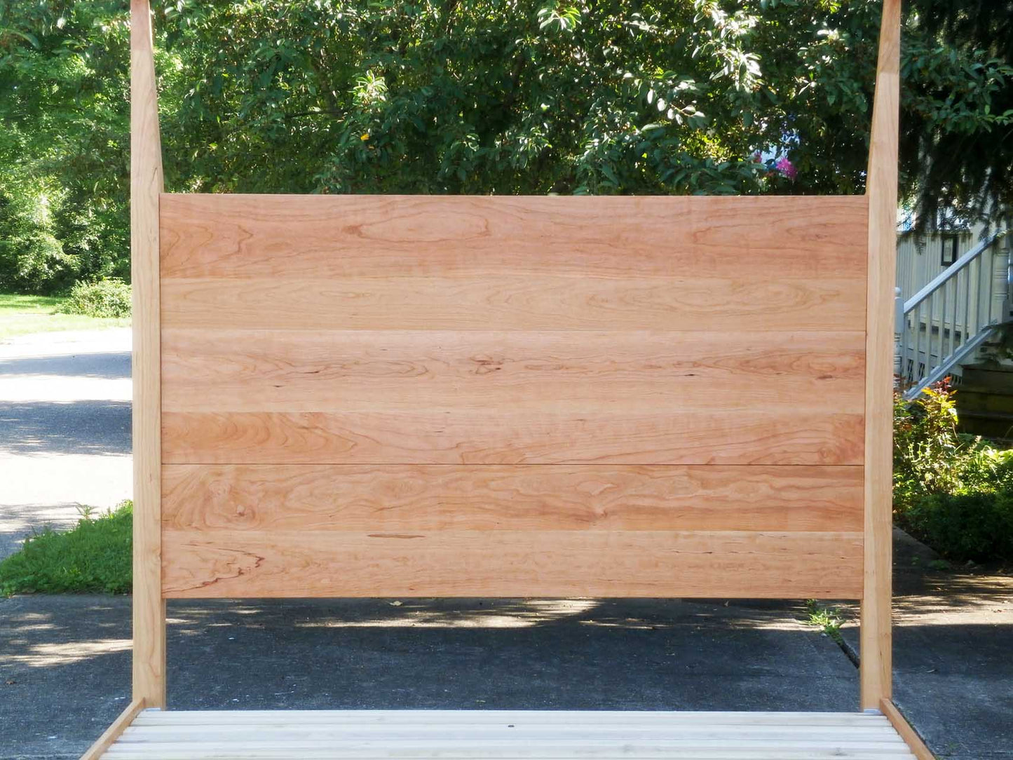 headboard of Canopy Bed with a low platform