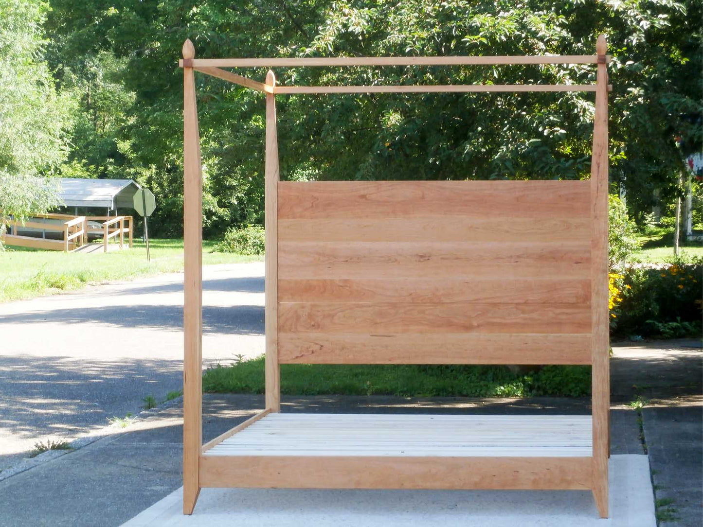 front view natural Canopy Bed with a low platform
