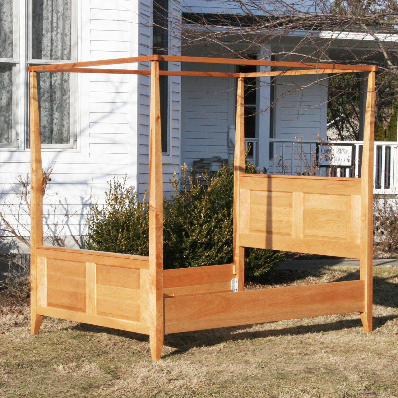 solid hardwood Canopy Bed with panels and tapered posts side angled view