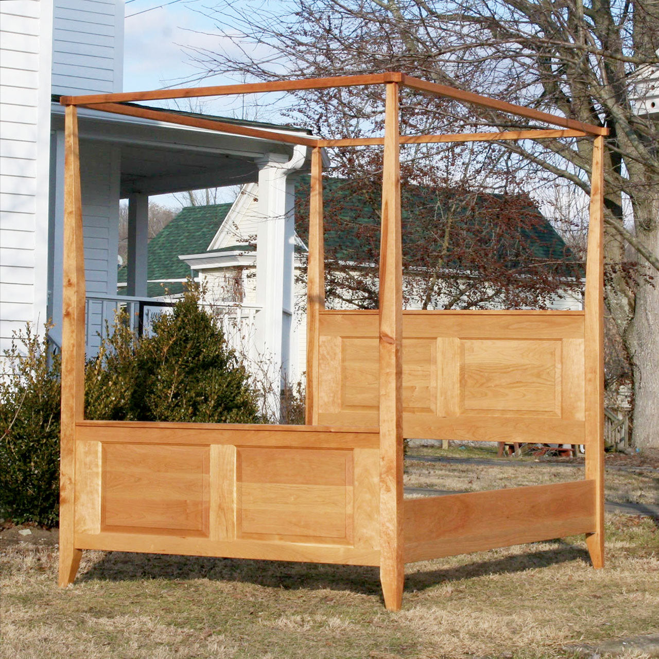 front angled view solid hardwood Canopy Bed with panels and tapered posts
