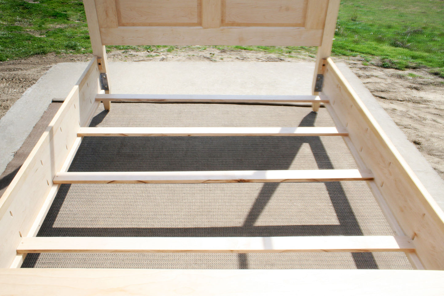 slats of wood Canopy Bed with panels and tapered posts