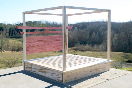 angled view Torii Gate bed with 6 drawers and square canopy