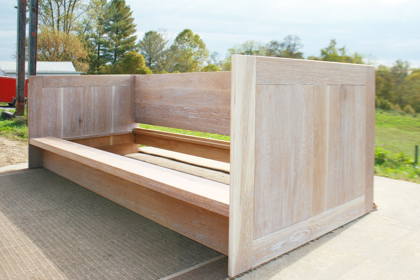 close angled view Day Bed with a solid back and sides