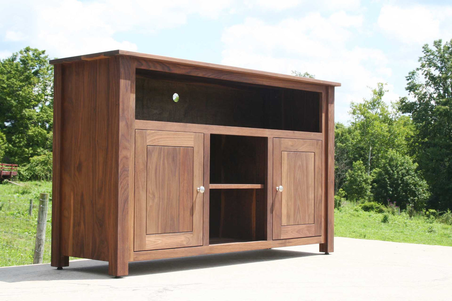 front angled view Walnut entertainment console