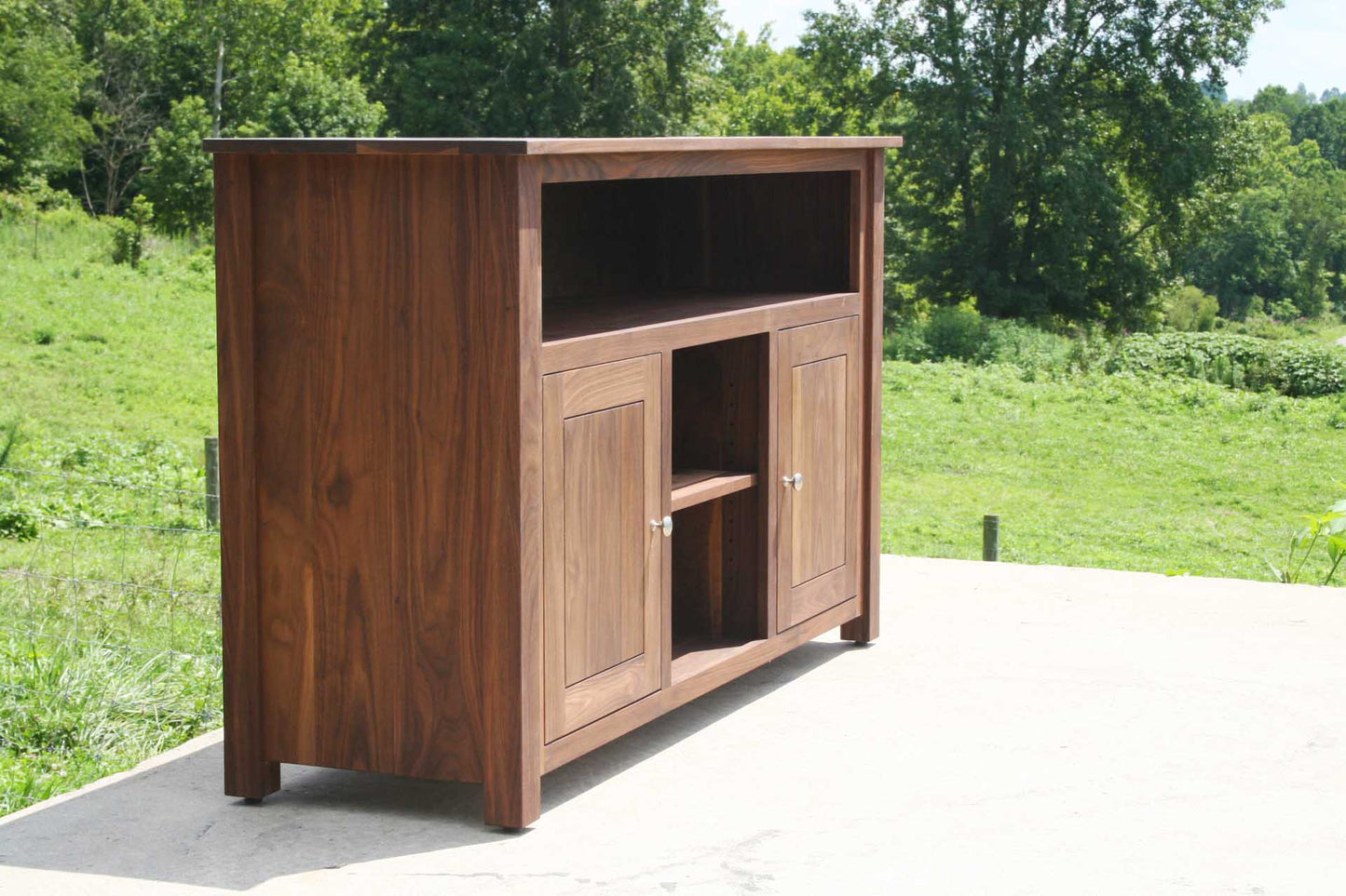 angled view Walnut entertainment console