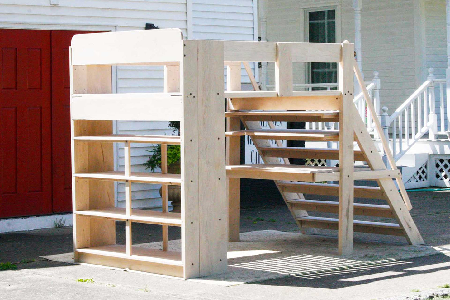 Loft bed with desk, stairs, and medium-depth shelves lbsnv01