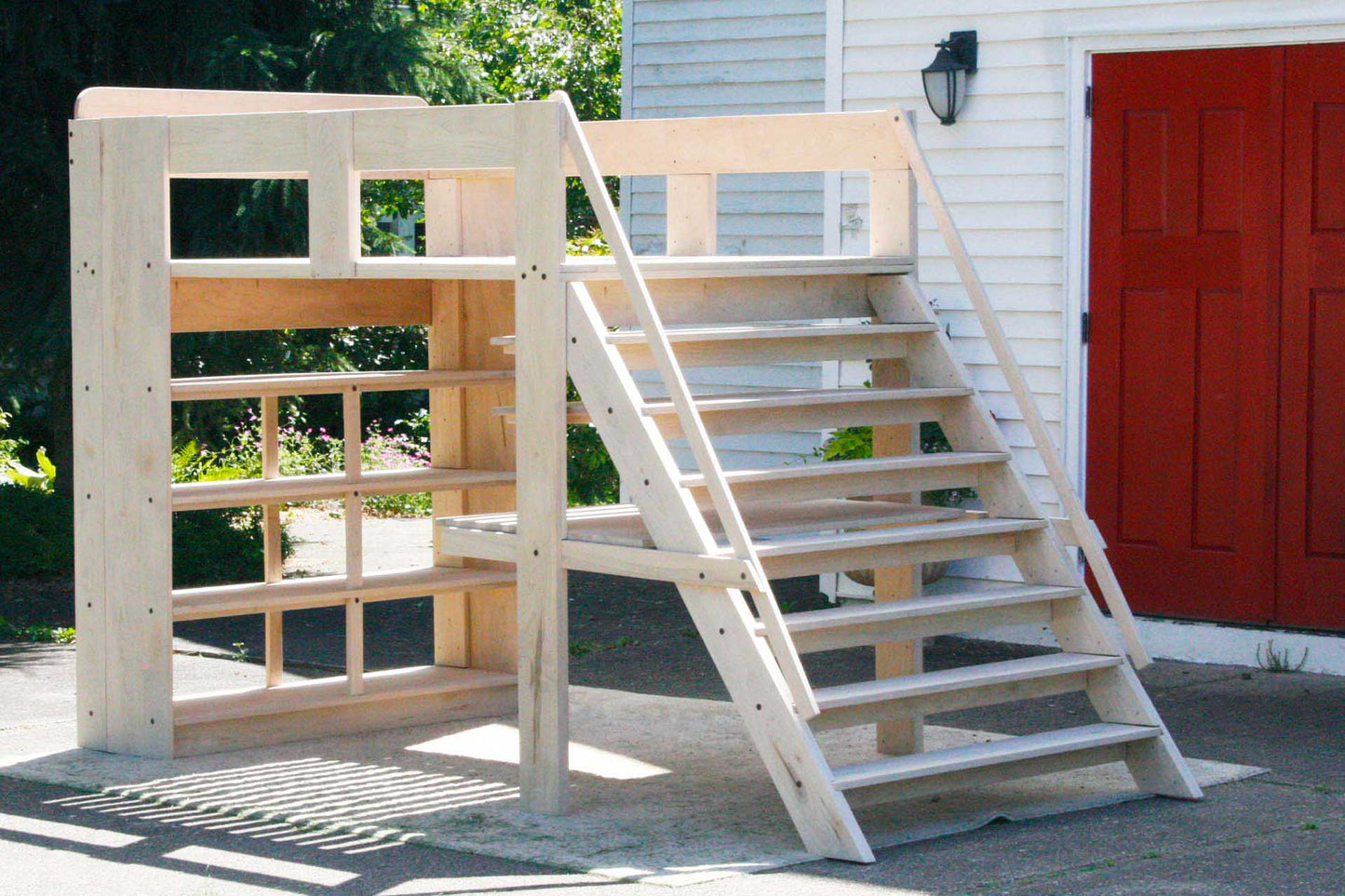 Loft bed with desk, stairs, and medium-depth shelves lbsnv01