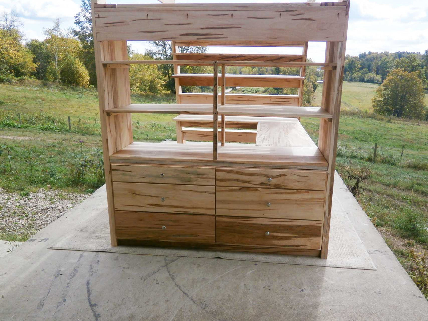 back of natural Loft bed with Built In Dresser and Desk