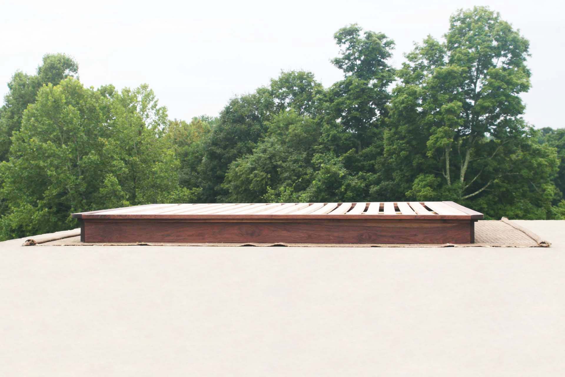 low platform bed or tatami with side trim side view