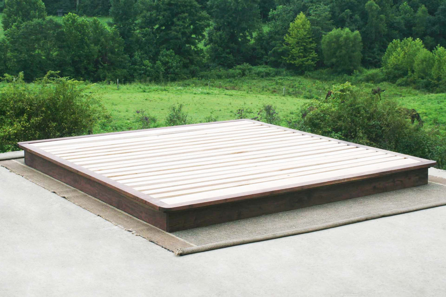low platform bed or tatami with side trim