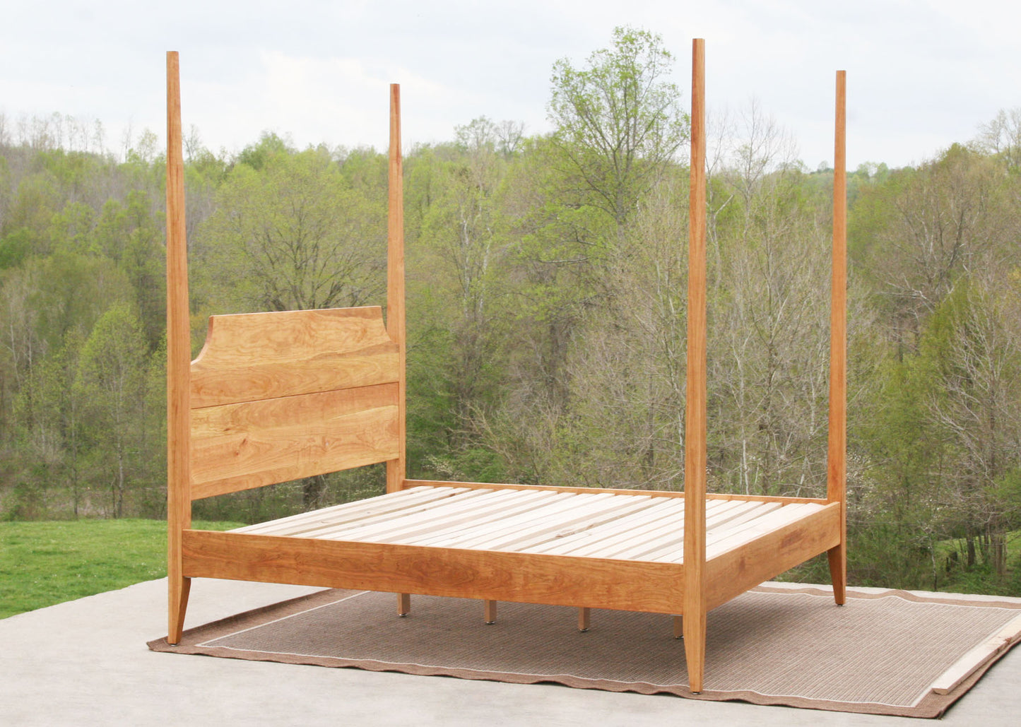 side view natural Four poster bed with tapered posts