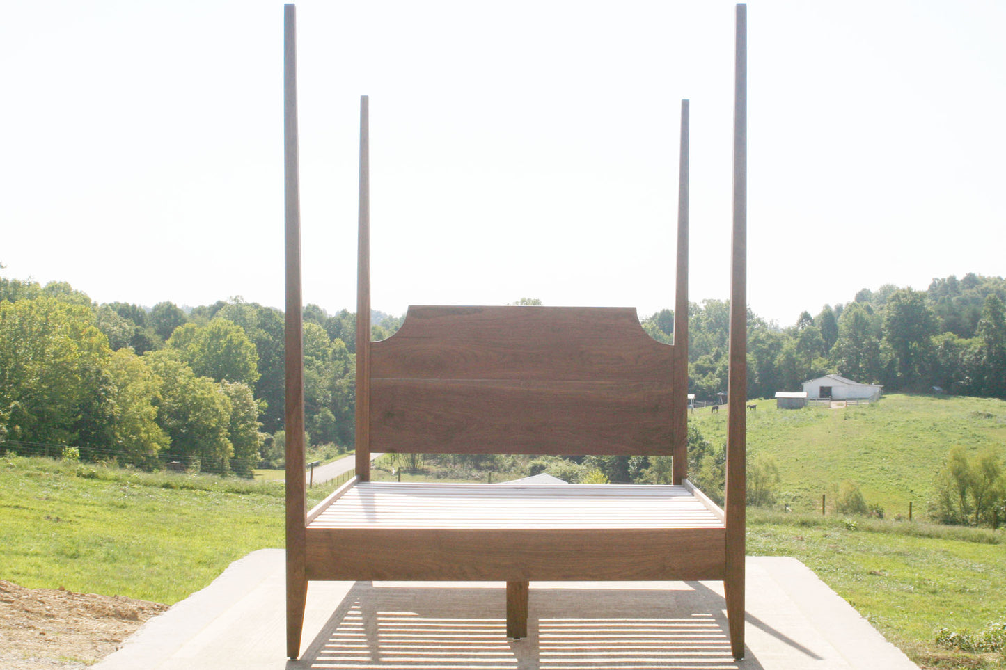 solid hardwood canopy bed front view