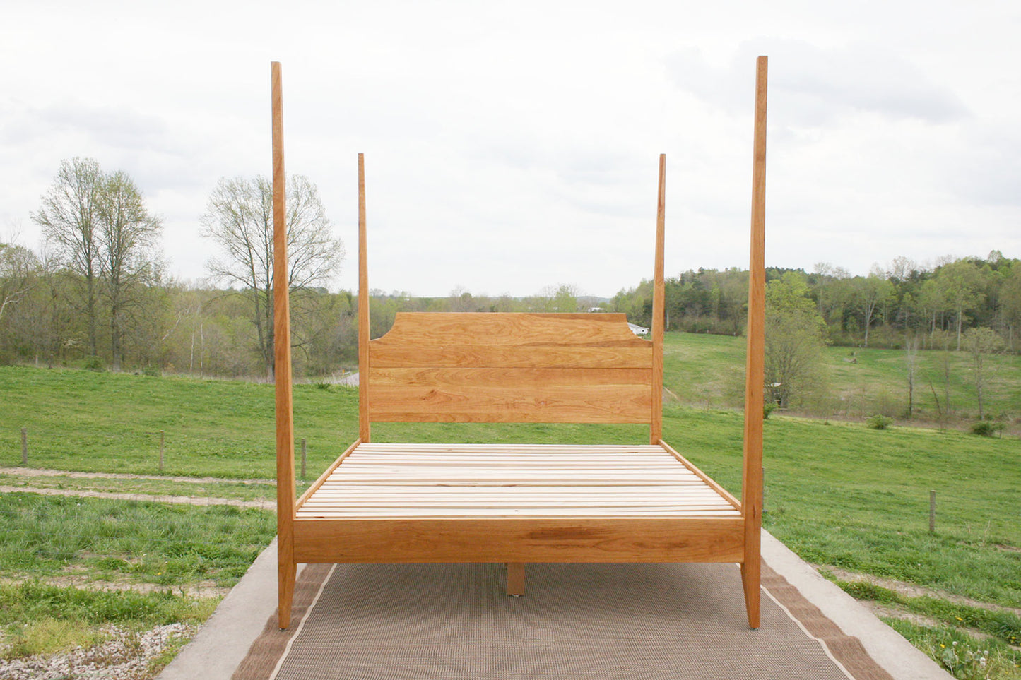 front view natural Four poster bed with tapered posts