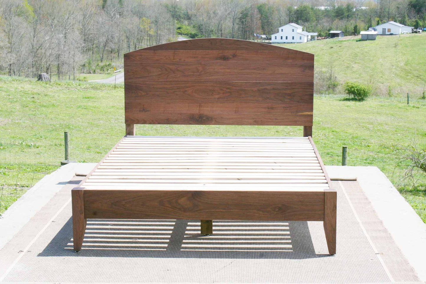 arched headboard bed