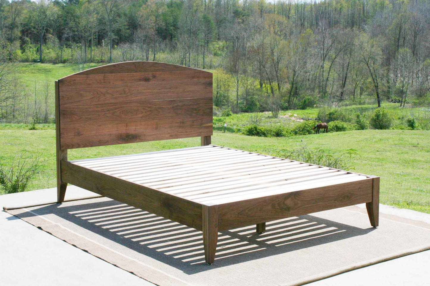 bed with tall headboard