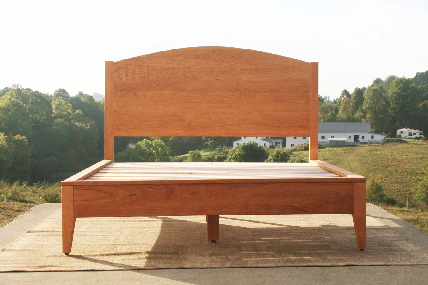front view natural Platform bed with curved headboard