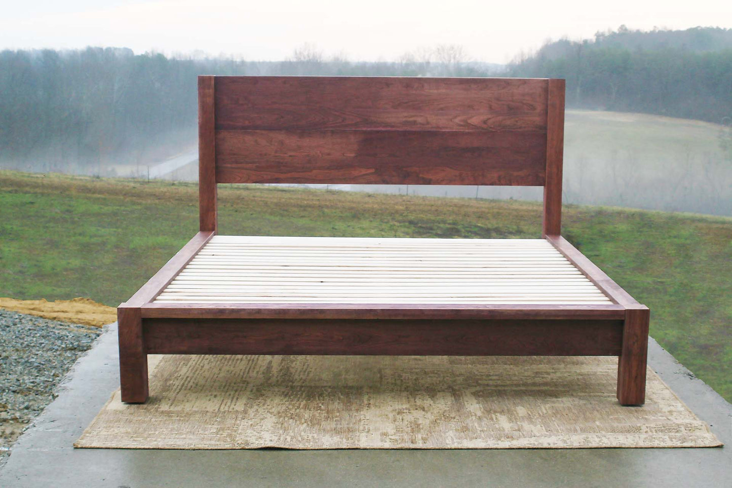front view platform bed with thick posts and vertical headboard
