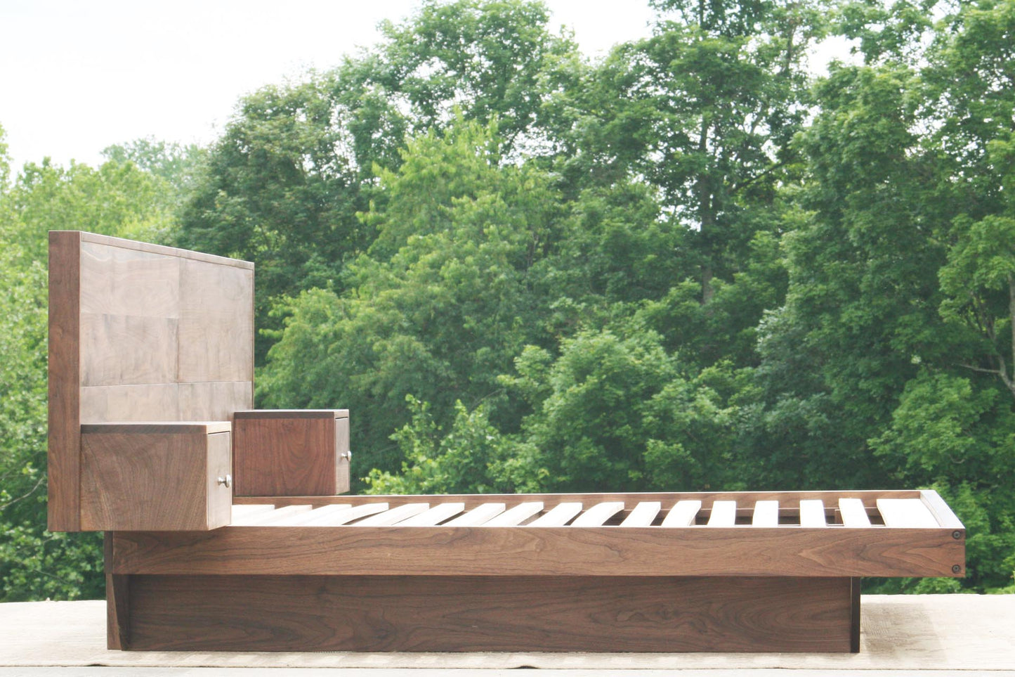 floating platform bed with headboard side view