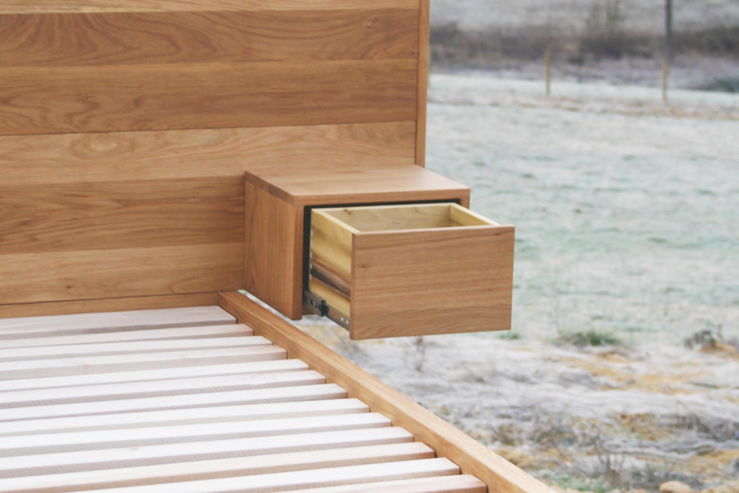 attached nightstand on Floating platform bed with headboard