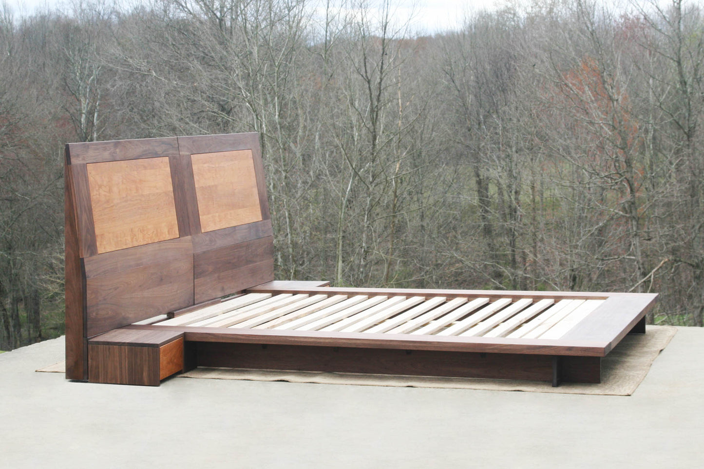 angled view Low platform bed with side tables