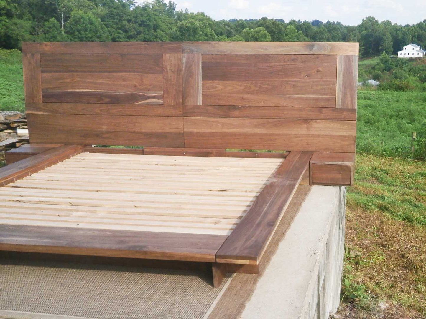 platform bed with side tables front angled view