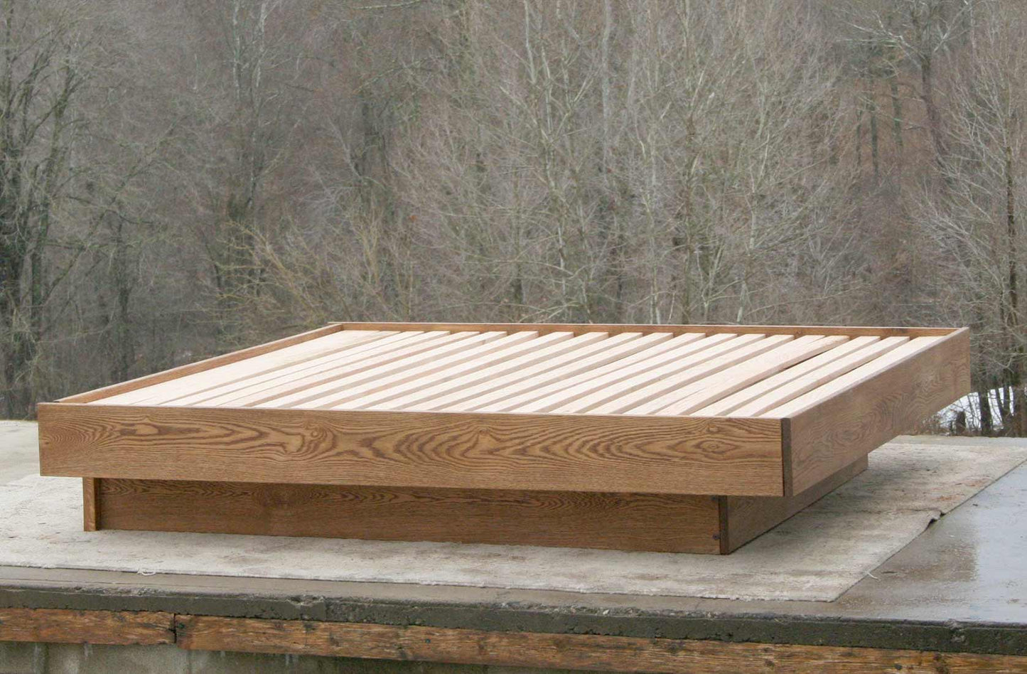 floating platform bed with no headboard side view