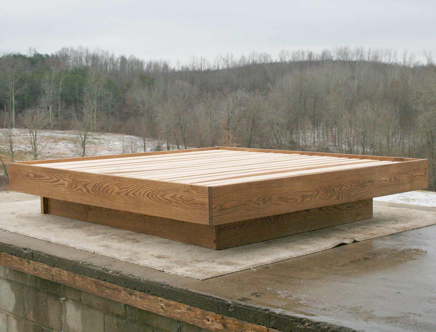 angled view floating platform bed with no headboard
