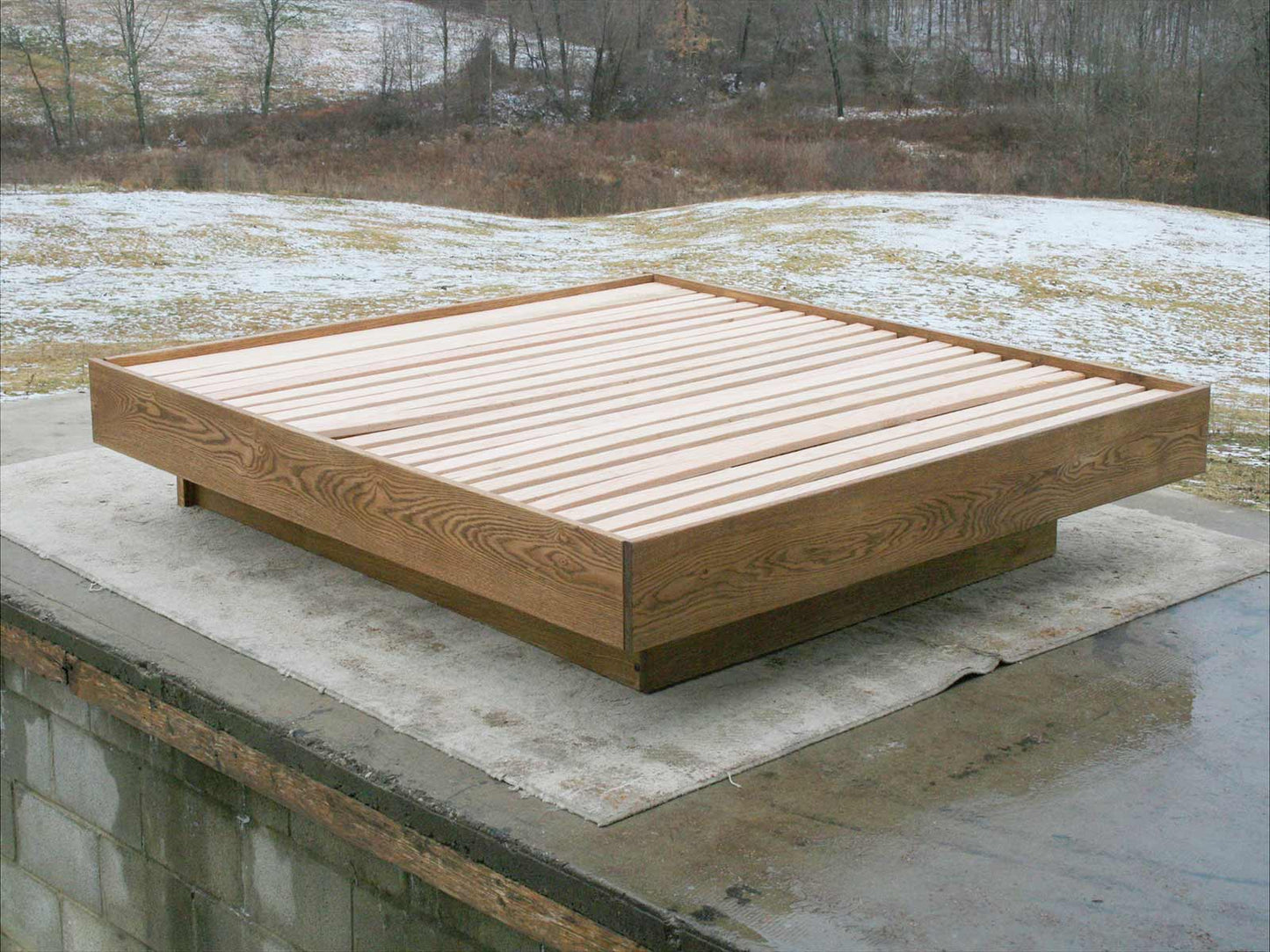 top angled view platform bed with no headboard