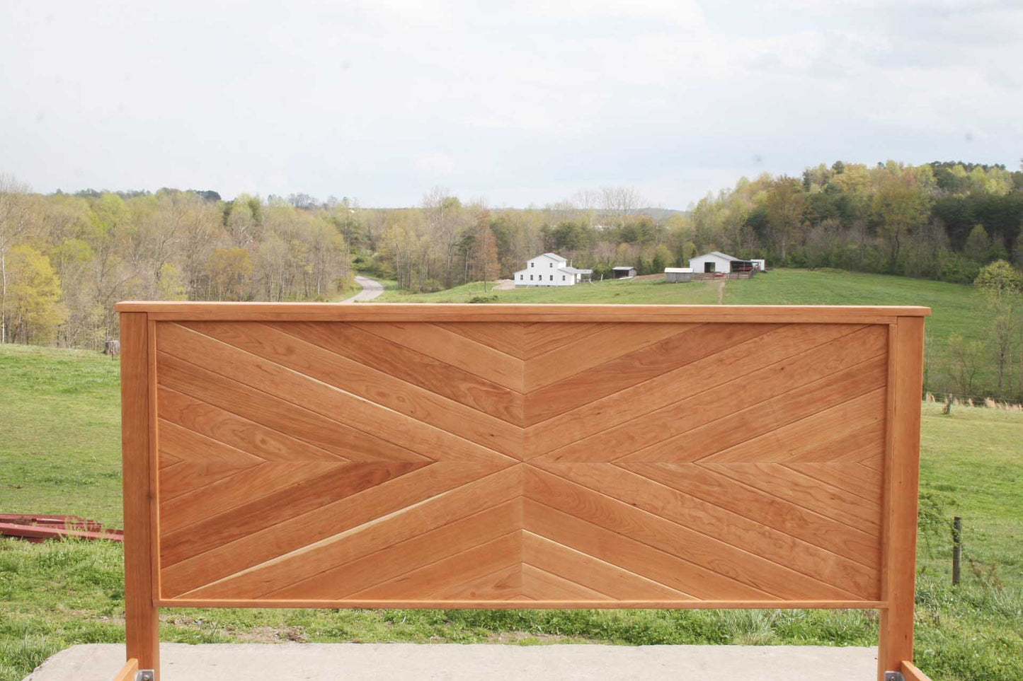 Platform Bed with headboard in herringbone style light colored headboard view
