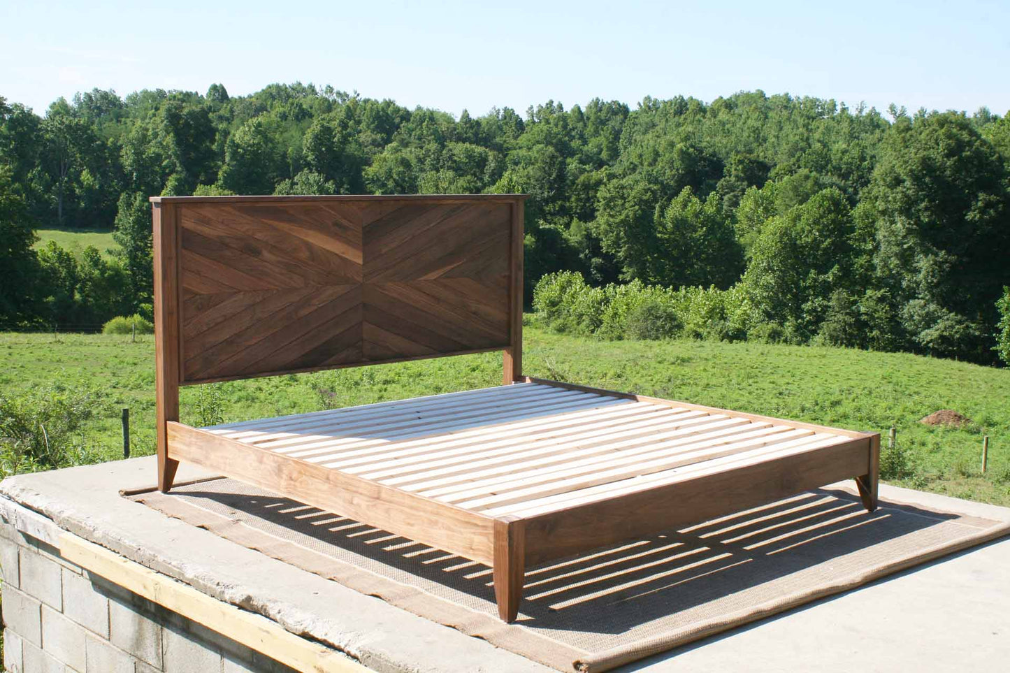 Platform Bed with headboard in herringbone style side view