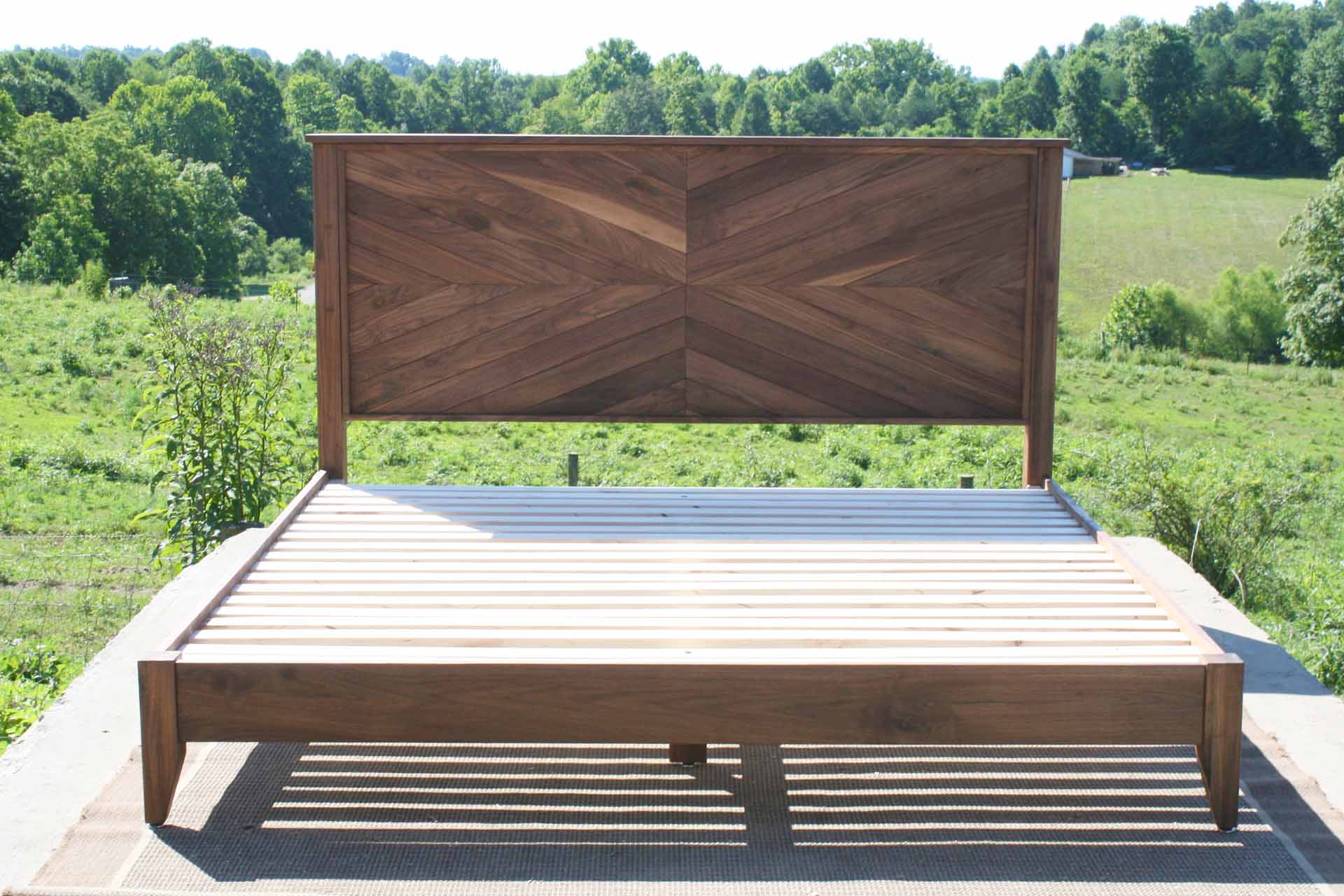 Platform Bed with headboard in herringbone style front view