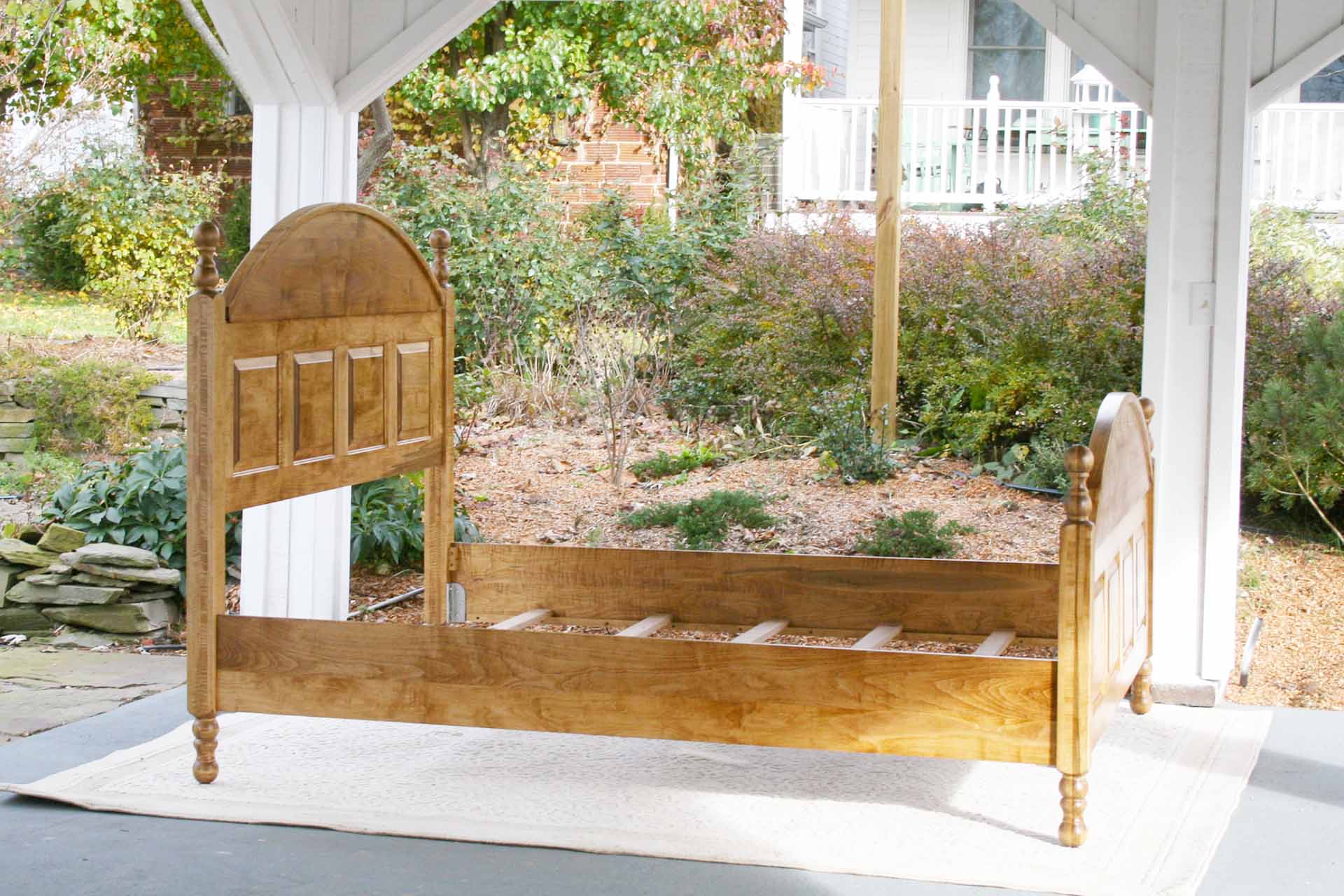 four post bed straight on side view