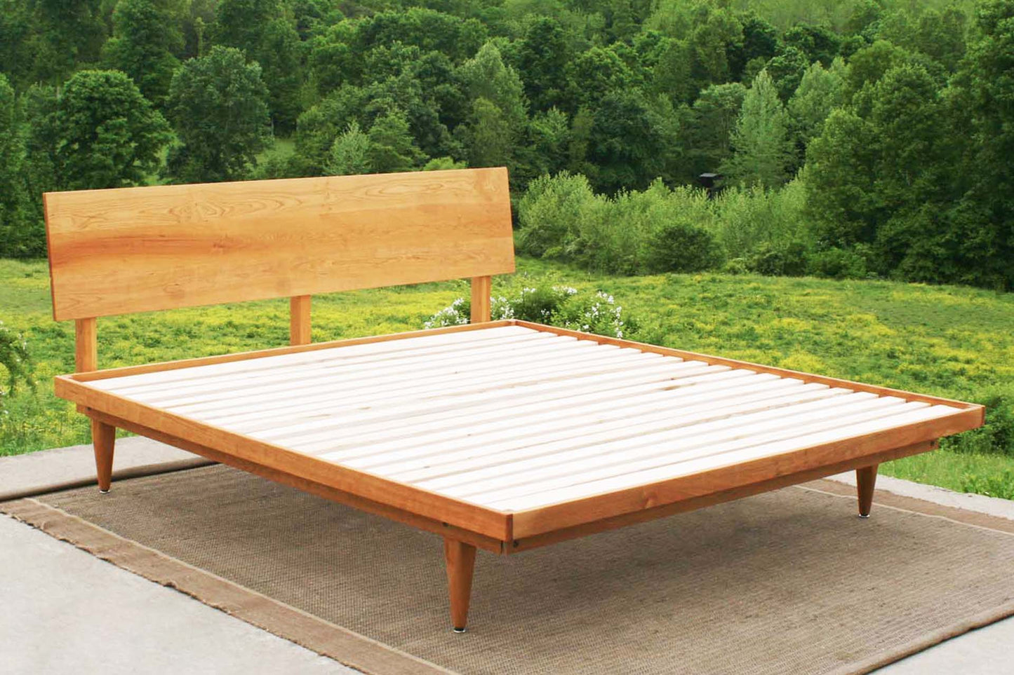 angled headboard bed natural wood