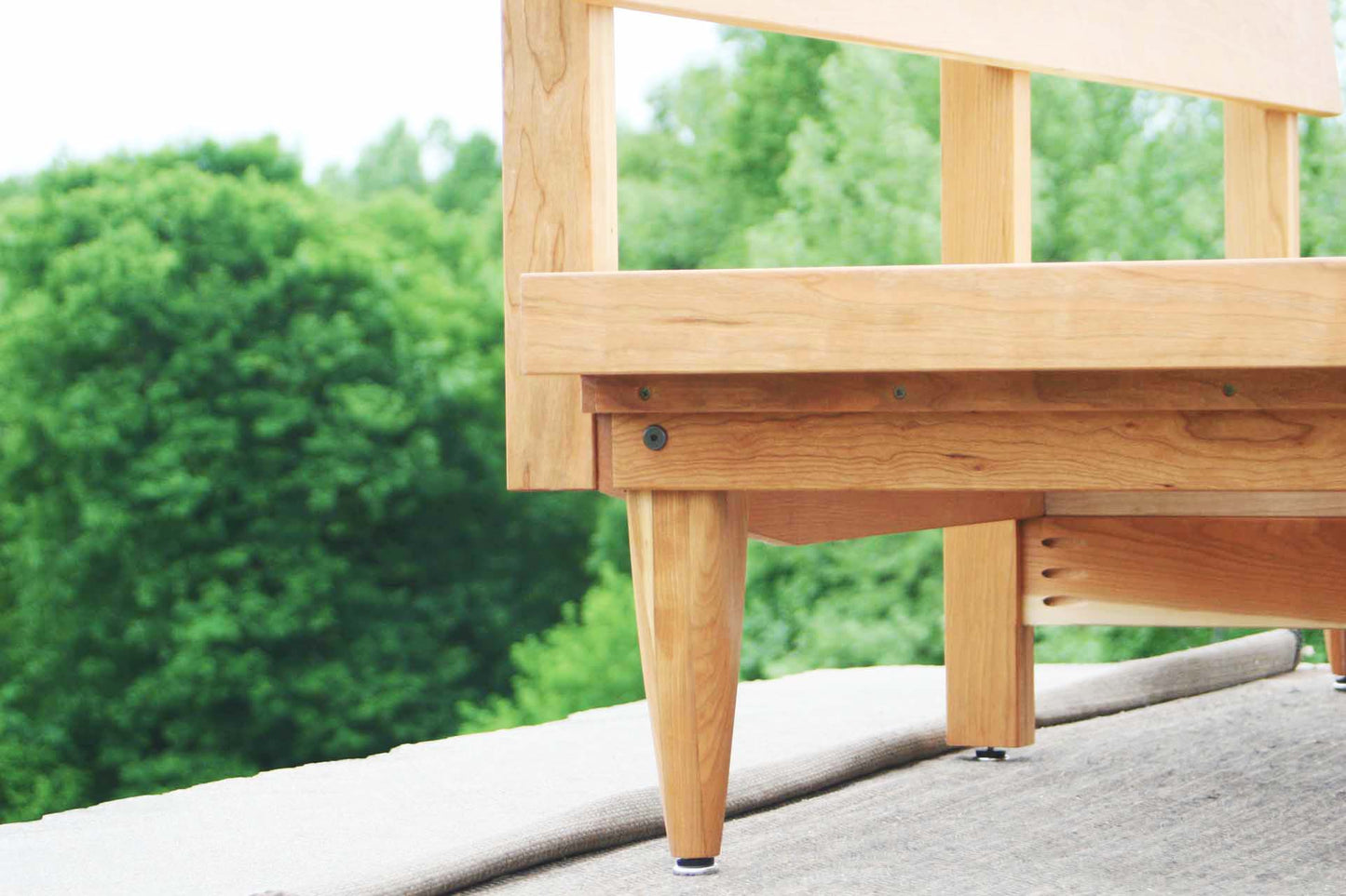 angled headboard bed low view